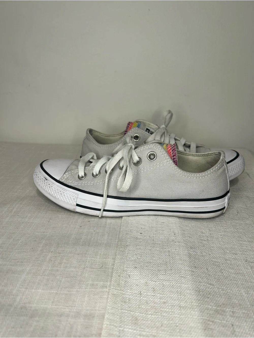 Converse Low Top Sneakers in Light Gray with Rainbow Tongue
